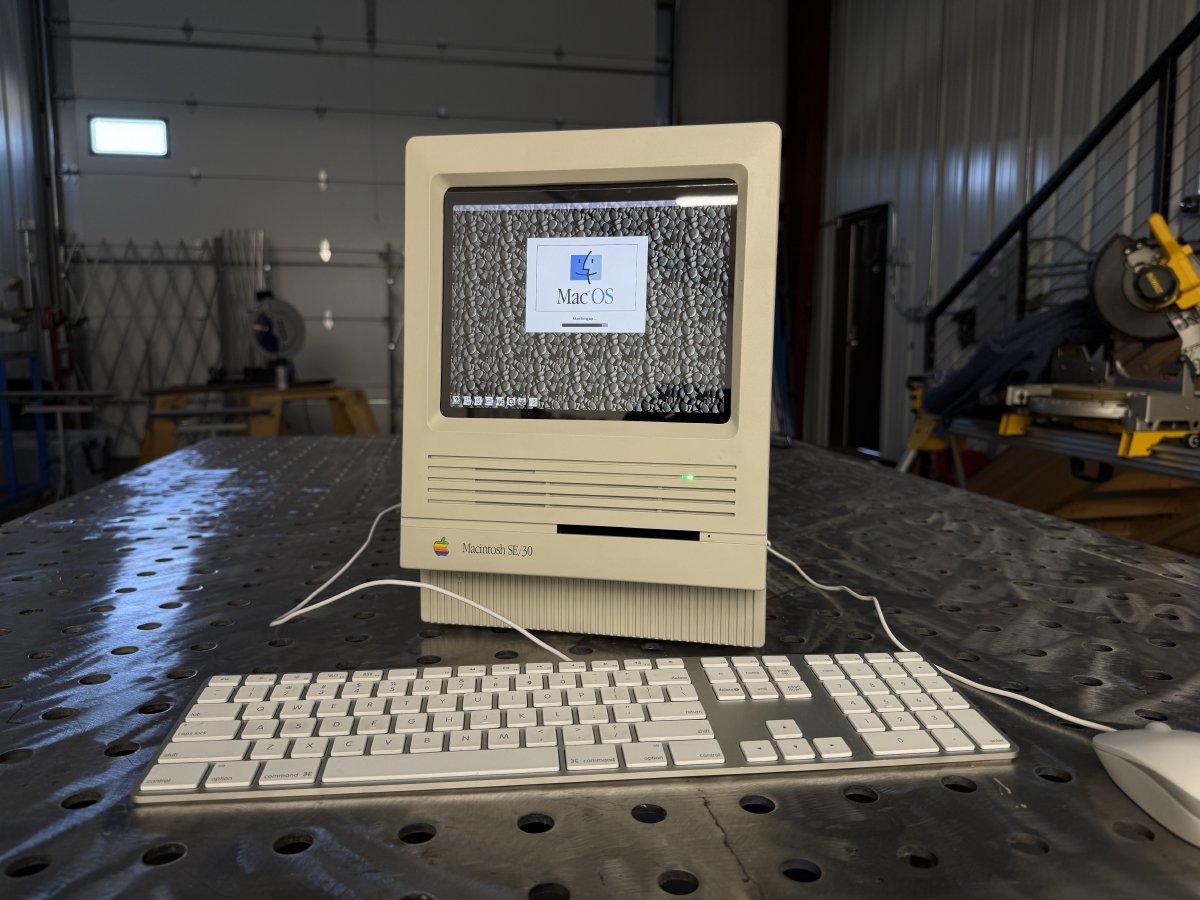 The reimagined Macintosh SE/30 with a modern Apple keyboard, booting Mac OS