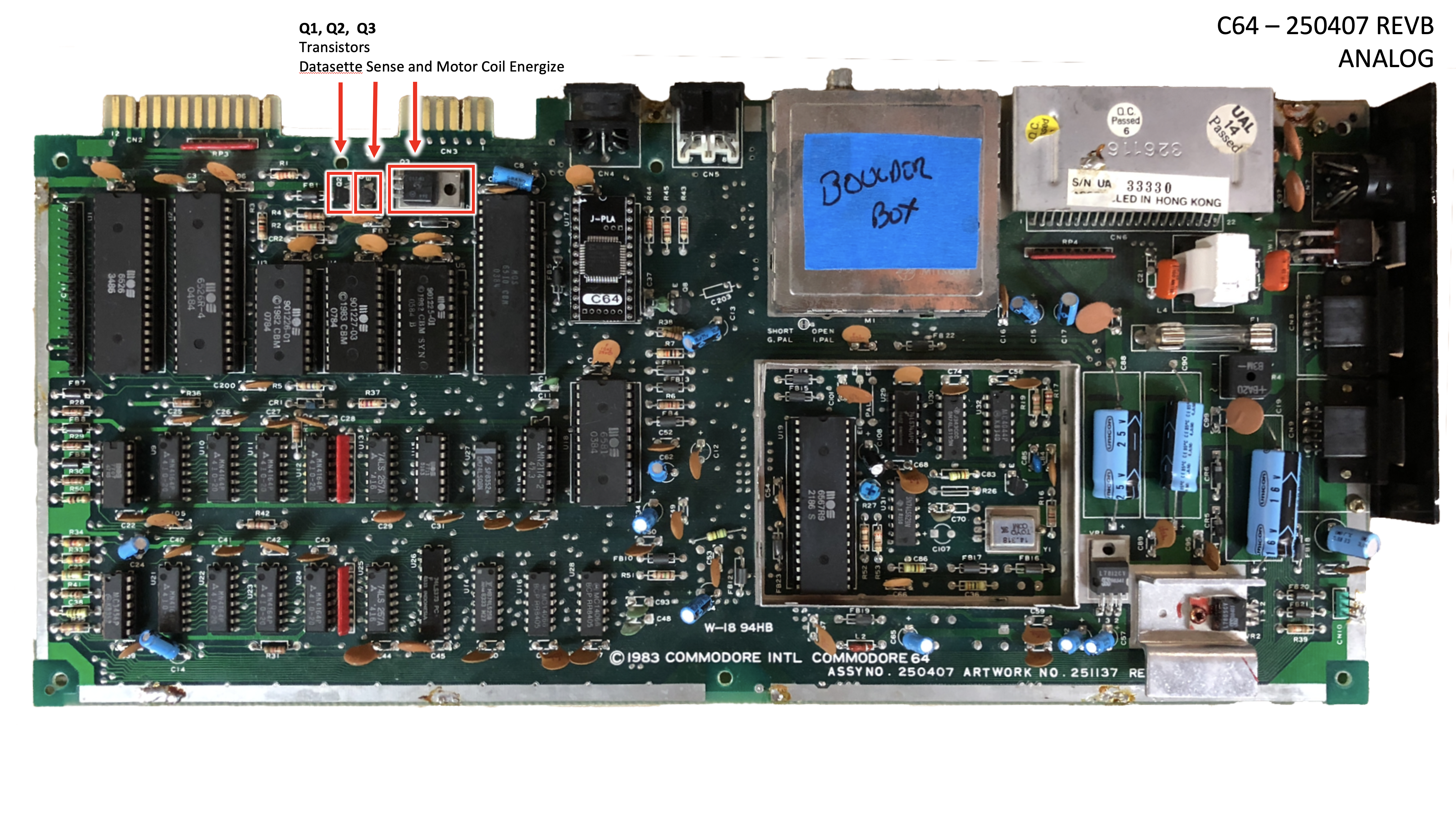 The 250407 motherboard with the discrete transistors that drive the datasette labeled